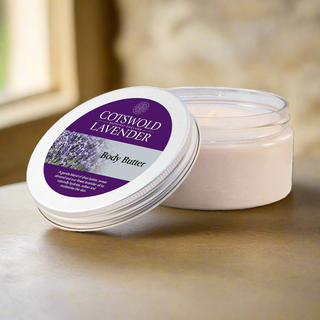 Cotswold Lavender body butter jar with purple label on a white background