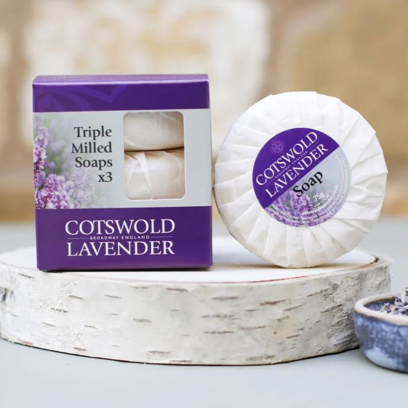 Cotswold Lavender soap and packaging on a wooden surface with blurred background