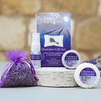 Cotswold Lavender gift set with lavender bag, bottle, and soap on a wooden block.