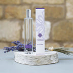 Cosnold Lavender perfume bottle and packaging on a stone surface with lavender flowers.