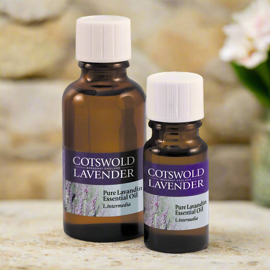 Two bottles of Cotswold Lavender pure lavandin essential oil on a white background
