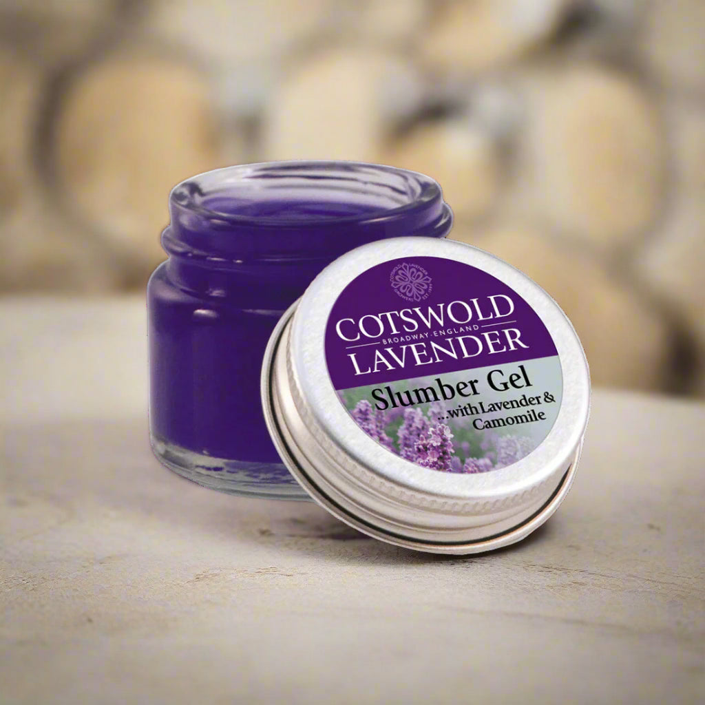 Cotswold Lavender slumber gel jar with purple lid on a wooden surface
