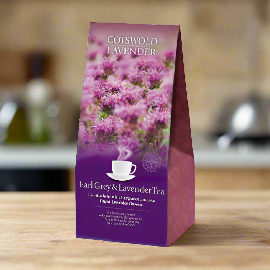 Cotswood Lavender Earl Grey & Lavender Tea package with lavender flowers on a white background