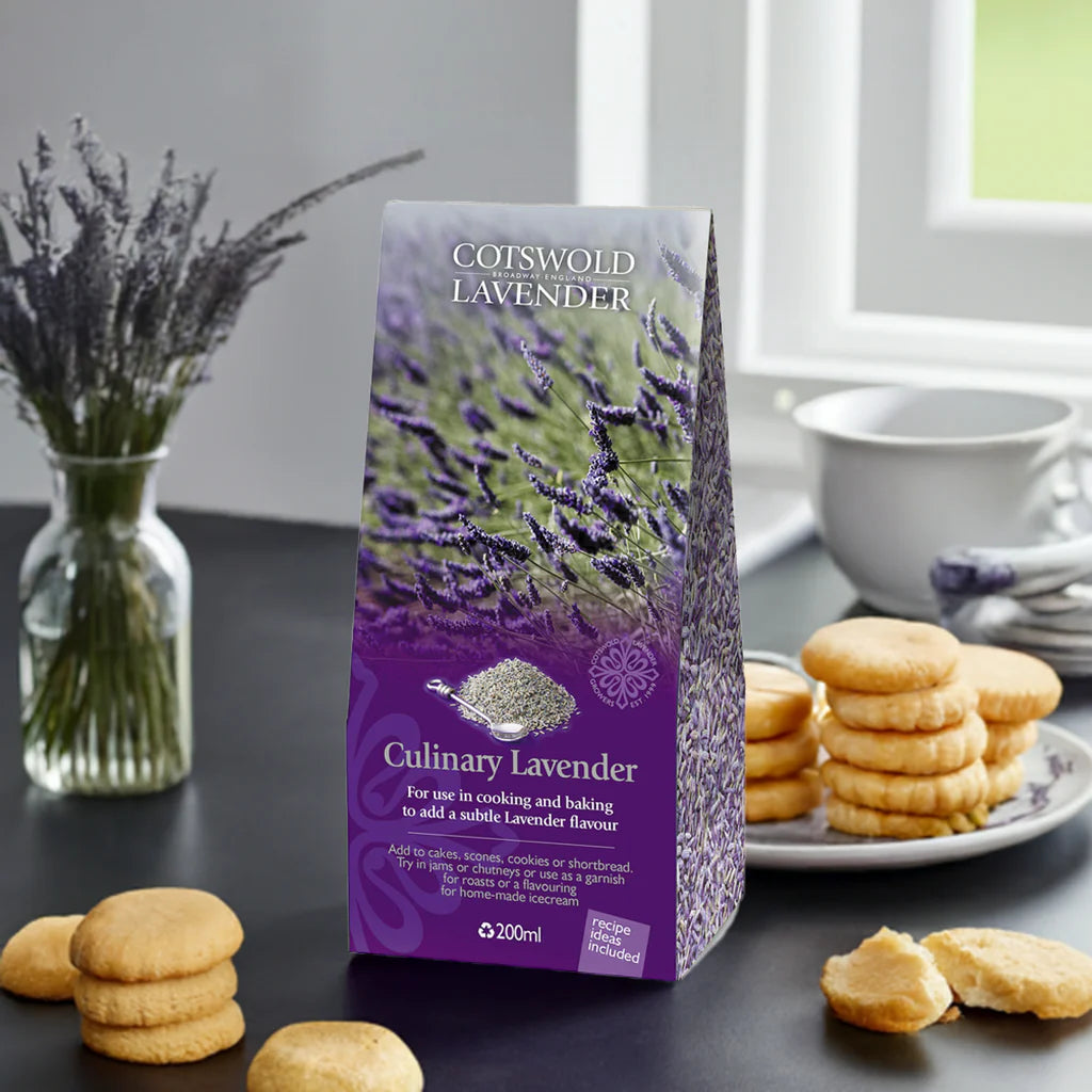 Coastal Lavender packaging on a table with cookies and lavender flowers